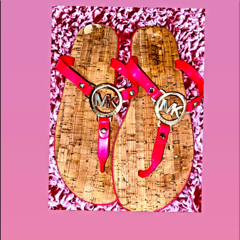 MK sandals with minor damage on back heel